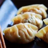 Gyoza · 6 pieces. Pan-fried dumplings.
