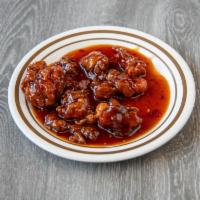 S2. General Tso's Chicken · Choice chicken meat sauteed with broccoli in a spicy brown sauce. Spicy.