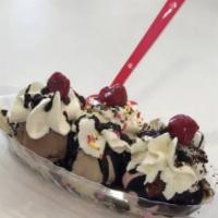 Fancy Sundae · 3 scoops of your selection, included toppings of your choice.
