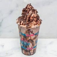 Chocolatechino Shake · Chocolate ice cream, cookie crumbs and fudge chocolate topped with vanilla ice cream.