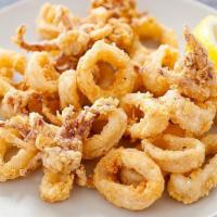 Calamares · Crispy fried calamari served with marinera sauce