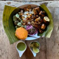 Tripa mishqui  · Traditional pork intestine, hominy, fava beans, pickled onions, potato pattie and corn nuts