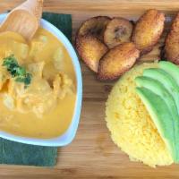 Guatita · Beef tripe stew served over yellow rice, sweet plantain, avocado mixed greens.