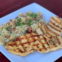 Calentado · Thin grilled steak or chicken breast served over rice mixed with eggs and beans, avocado, mi...