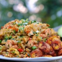 Chaulafan · Stir-fry rice mixed with shrimp, beef, chicken, egg, onions, peas and carrots