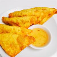 A6. 6 Pieces Fried Wonton · Ground chicken wrapped in wonton skin and served with plum sauce.