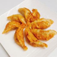 A7.  Potstickers (8 pieces) · Chicken cabbage onion carrot deep fried with plum sauce.
