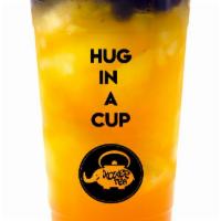 Mango Passionfruit Tea · Hand-crafted jasmine-infused green tea with mango and passionfruit.