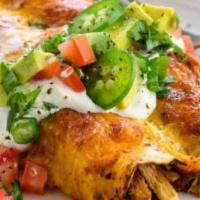 Enchiladas · Four soft corn tortillas filled with chicken or beef, topped with red sauce and shredded che...