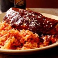 Chicken Mole · Savory chicken smothered in a delicious curry-style sauce.