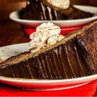 Double Dark Chocolate Cake · Moist dark chocolate cake with layers of rich chocolate frosting
