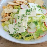Tahini Caesar Salad · Romaine lettuce, vegan feta, garlic, roasted chickpeas.