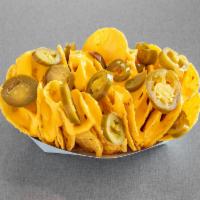 Nachos · Tortilla chips served with nacho cheese and jalapenos.