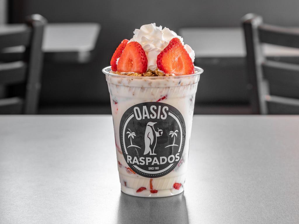 Fresas Con Crema · Strawberries with cream topped with whipped cream.
