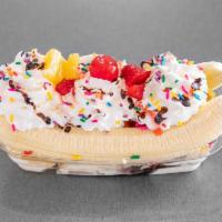 Banana Split  · Made with your choice of two fruits and ice cream in between a banana topped with whipped cr...