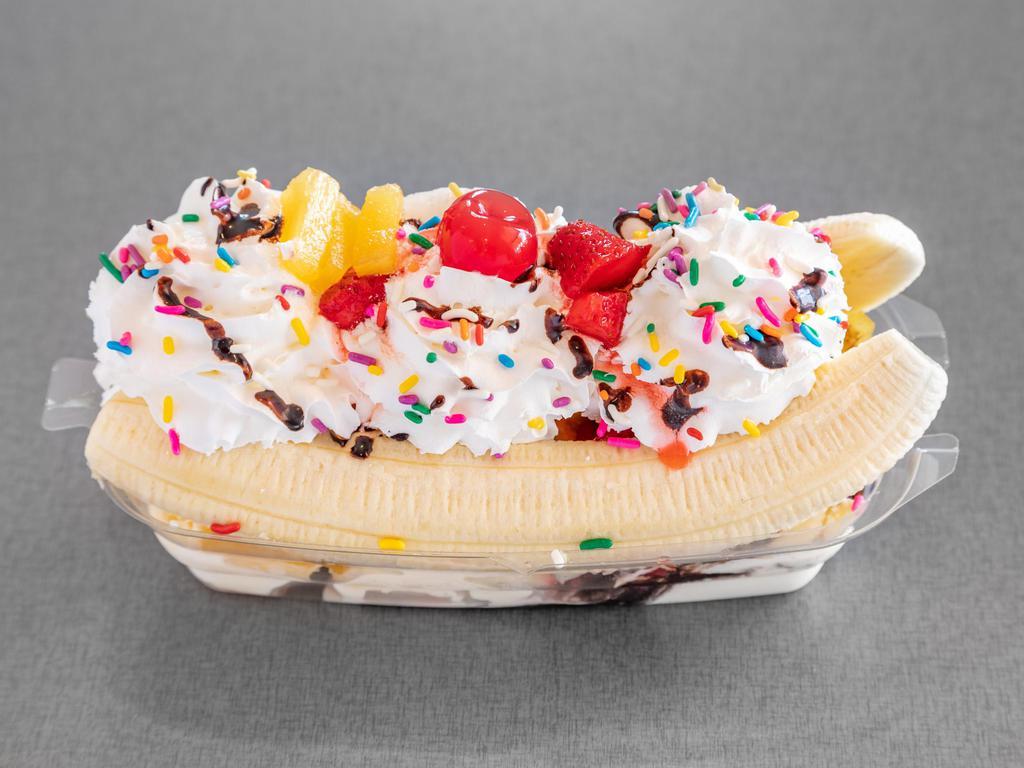 Banana Split  · Made with your choice of two fruits and ice cream in between a banana topped with whipped cream, sprinkles, chocolate sauce, and a cherry.