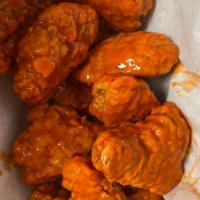 Buffalo Wings · Choose from plain, mild, hot, or BBQ. Our famous, breaded, meaty chicken wings fried to perf...