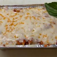 Baked Mostaccioli · Penne pasta layered with ricotta cheese, meat sauce and finished with mozzarella cheese. Bak...