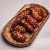 Seoul Wings · Battered and fried Korean BBQ wings tossed in our special Korean BBQ sauce. Your choice of s...