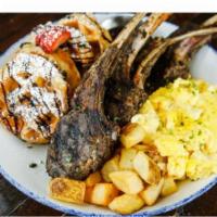 Jerk Lamb Chops ＆ Eggs · Served with two eggs any style, choice of grits or hash browns and waffles.