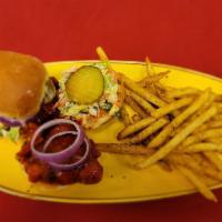 Tim's Nashville Hot Chicken Sliders · Marinated chicken breast fried to a golden brown and tossed in Nashville Hot Sauce. Served o...
