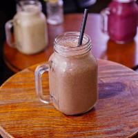 Chocolate Crush Smoothie · Banana, dates, almond butter, cacao nibs, mocha powder, cacao powder and chocolate hemp prot...
