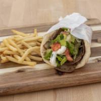 Lamb Gyro · Wrapped Pita bread, lamb, lettuce, tomatoes, and tzatziki sauce.