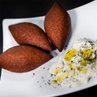 Deep Fried Kibbeh · Crunchy and handcrafted kibbeh filled with beef, onions and pine nuts. Comes with choice of ...