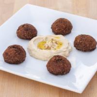 Falafel Platter · 5 deep fried and crunchy “falafel croquetes”. Served with choice of side.