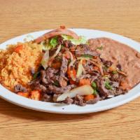Bistec a la Mexicana · Beef Steak with Onions, Tomato, and Jalapeño Peppers