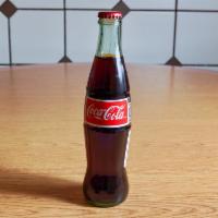 Sodas Importadas en Botella · Imported sodas. Coca-Cola, Sidral Mundet, Jarritos, Sangria Señorial, TopoChico.