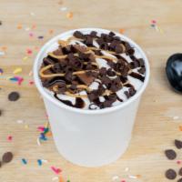 Reese's Peanut Butter Cup Milkshake · Vanilla ice cream infused with Reese's peanut butter cups topped with whip cream.