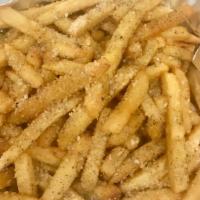 Zuba Fries · French fries shakin' with your choice of Buffalo sauce or garlic Parmesan sauce.