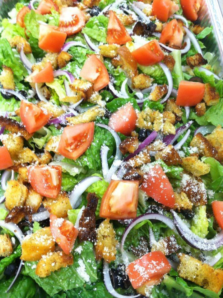 Garden Salad · Hot and sweet peppers, black olives, red onion & tomato.