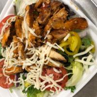 Buffalo Chicken Salad · Garden salad with chicken fingers dipped in your choice of wing sauce and topped with mozzar...