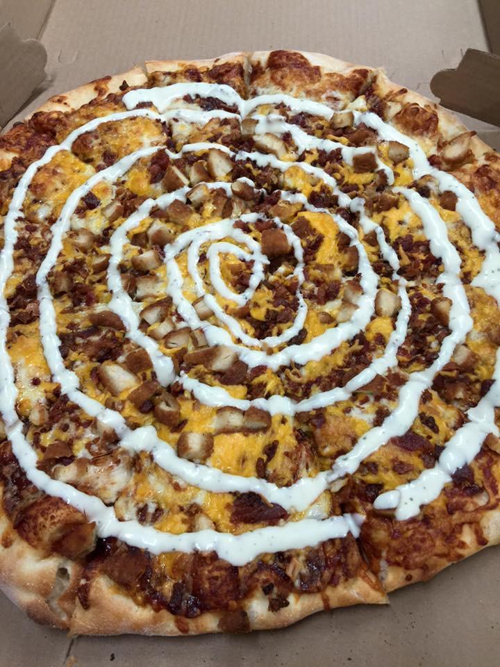Chicken Bacon Ranch Pizza · BBQ sauce, chicken fingers, bacon, cheddar & mozzarella cheese, topped off with ranch dressing.