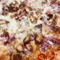Donovan Pizza · Chicken fingers, Swiss cheese, mozzarella cheese, ham & country sweet sauce.