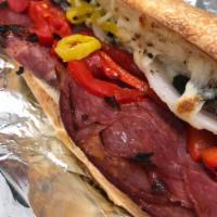 Antipasto Sub · Cappicola, salami, mozzarella, roasted red and hot peppers, onions, black olives & oil.