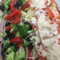 The Chuckles Sub · Broccoli, roasted red peppers, red onions, tomatoes, mozzarella, lettuce, black olives & gar...