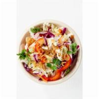 Cambodian Slaw · Napa cabbage, red cabbage, white cabbage, bell peppers, fresh herbs and house dressing. Spicy.
