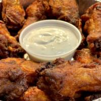 Chicken Wings · 10 of our famous chicken wings. Carefully selected wings are set in brine then seasoned to p...