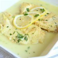 Chicken Francese · Breast of Chicken in a White Wine, Lemon and Butter Sauce