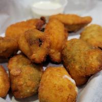 Jalapeno Poppers · Fried jalapeños stuffed with cream cheese