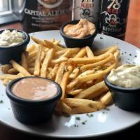 Belgian Style Fries · Served with Belgian-style flavored mayonnaises including citrus-cayenne, roasted garlic, pes...