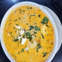 Chupe de Pescado · Fish soup with milk, vegetables, rice and cheese.