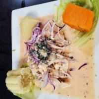 Ceviche de Pescado · Fresh fish chunks marinated on lime juice and mixed with red onions, cilantro, and rocoto ho...