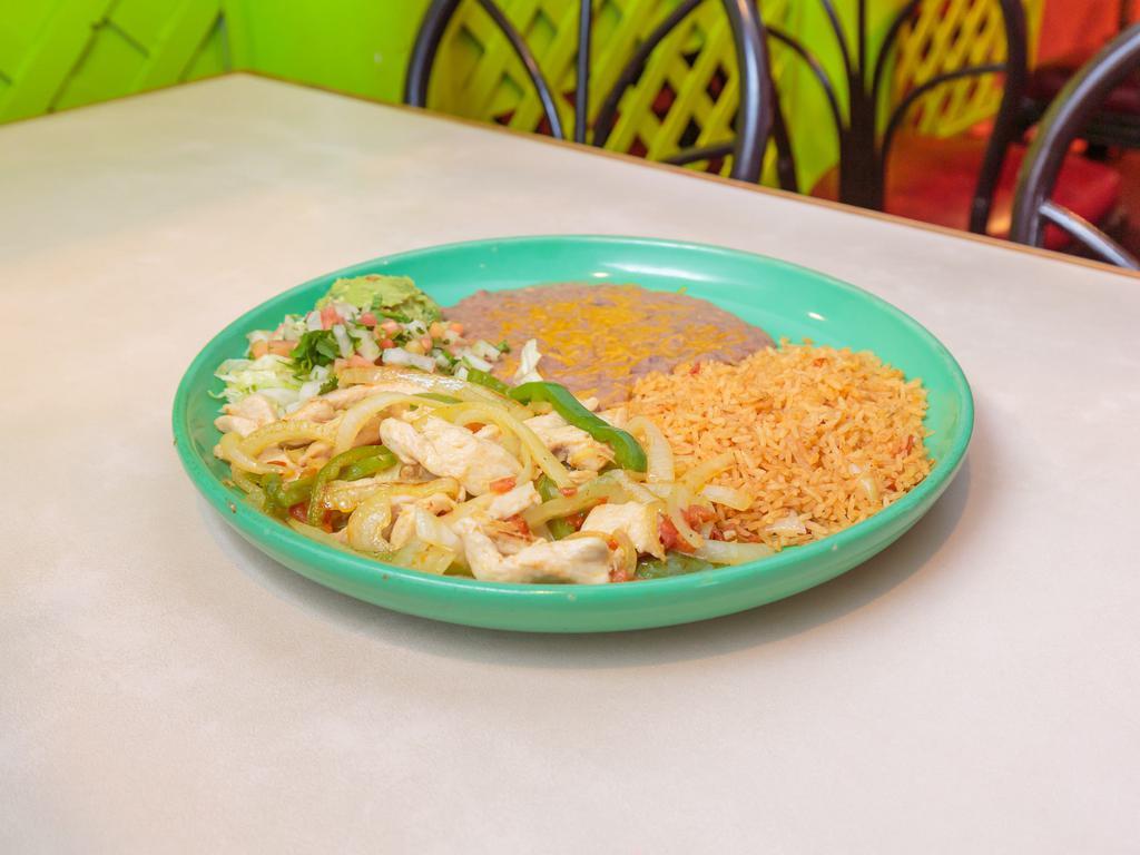 Chicken Carnitas · Chunks of chicken breast sautéed with green peppers and onions. Served with guacamole, rice, and beans.