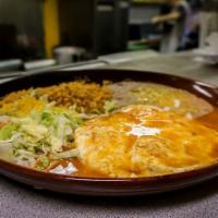 Huevos Rancheros · Two eggs over easy topped with cheese and sauce. Served with beans, rice, and tortillas.