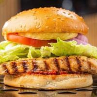 Intruder · Grilled chicken breast, romaine lettuce, tomato, and Salah's special burger sauce in a light...