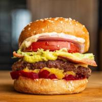 Super Glide · Grilled beef patty (1/2 lb), cheddar cheese, turkey bacon, mashed avocado, sliced beetroot, ...